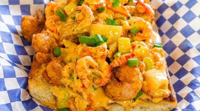 Cheese Overboard Shrimp Poboy (Crawfish Cheese Sauce).